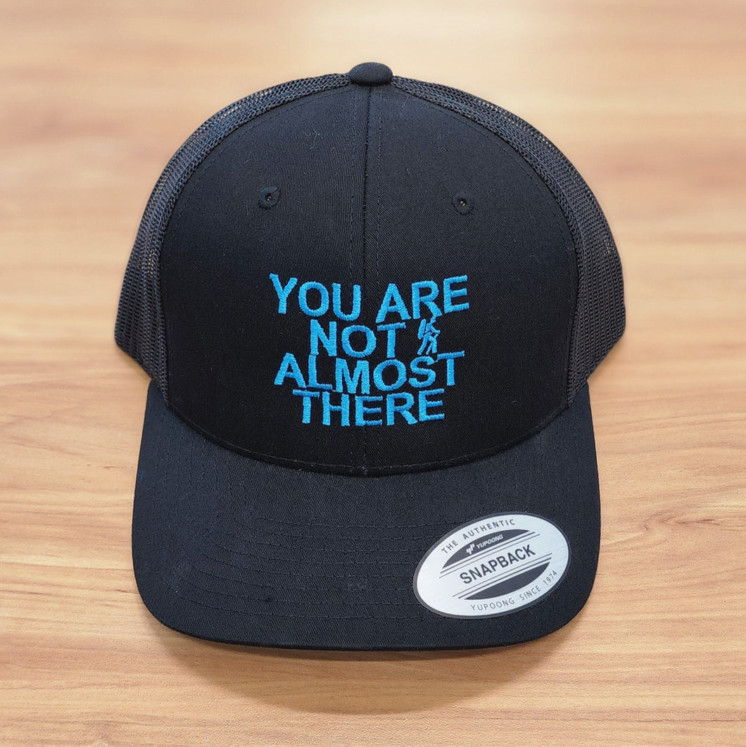 You Are Not Almost There Black Snapback Trucker Hat with Aqua Blue Thread
